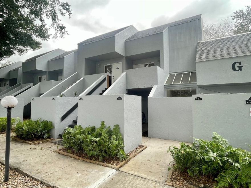 Unique open concept studio/efficiency type condo in the prestigious Deer Creek Country Club community. Convenient first floor location. Updated open kitchen with granite counters and backsplash, stainless steel appliances. Bathroom has also been renovated and has a huge walk-in shower. Tile floors throughout. Lots of closet space. Front loading W/D in unit. Open patio overlooking tennis courts. Roofs were just replaced and buildings painted in 2025. Beautiful golf course community w/NO mandatory golf membership required! Across from Constitution Park/Deerfield Beach Arboretum & close to shopping, major highways, & just over 4 miles to the Blue Wave award winning Deerfield Beach. Great investment property, can rent annually immediately!