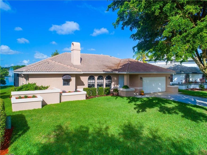 DON'T MISS THIS MAGNIFICENT 4/3 POOL HOME W/BREATHTAKING VIEW OF THE LAKE! LOCATED IN THE DESIRABLE OAKBROOK/HIDDEN HAMMOCKS SUBDIVISION! SPLIT BEDRM PLAN, FRESHLY PAINTED, REMODELED KITCHEN W/QUARTZ COUNTERS & CENTER ISLAND! REAL FIREPLACE! NEW PORCELAIN WOOD-LOOK PLANK FLRS W/UPGRADED BASEBOARDS IN OPEN AREAS, NEW LAMINATE WOOD FLRS IN MASTER BEDRM & GUEST RM! REMODELED MASTER BATHRM W/SEPARATE JACUZZI TUB & SEAMLESS GLASS SHOWER DRS! LG. SCREENED PATIO W/HEATED POOL!WALKING DISTANCE TO SCHOOLS & PARKS!