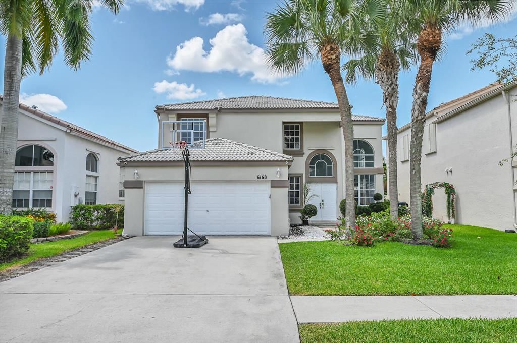 Photo of 6168 Branchwood Drive Dr, Lake Worth Beach, FL 33467 (MLS # R10803235)