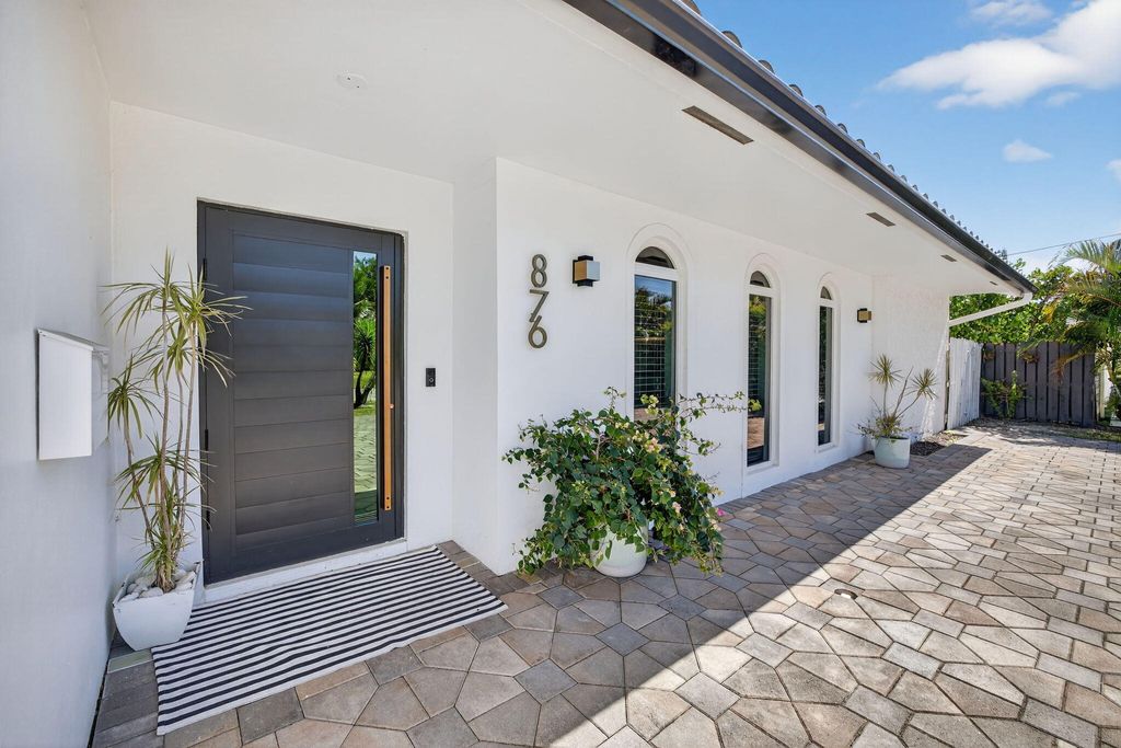 Photo of 876 NW 6th Avenue, Boca Raton, FL 33432 (MLS # R11161567)