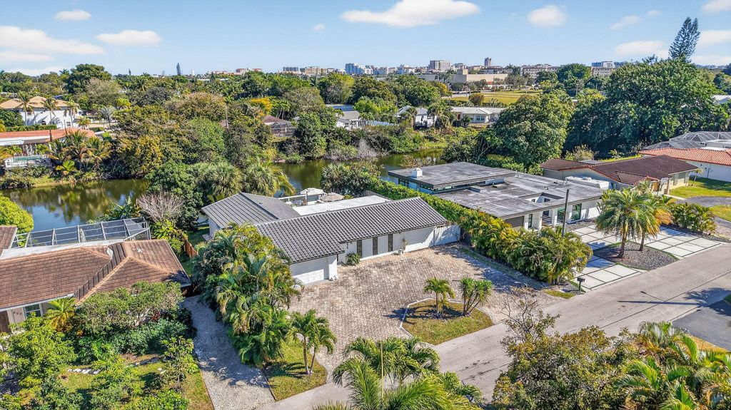 Photo of 876 NW 6th Avenue, Boca Raton, FL 33432 (MLS # R11161567)