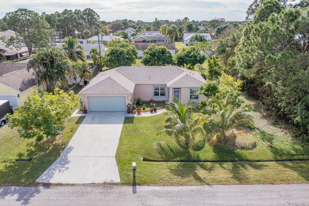 Photo of 692 NW Placid Avenue, Port Saint Lucie, FL 34983 (MLS # R10942468)