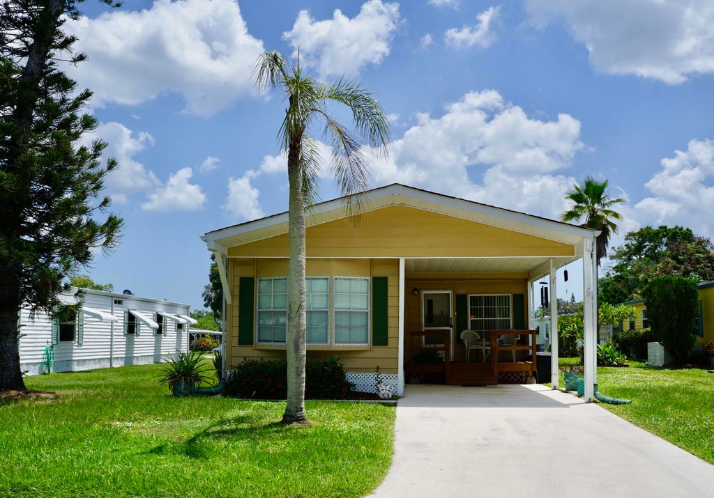 Photo of 21 SE Iberian Lane, Port Saint Lucie, FL 34952 (MLS # B26065846)
