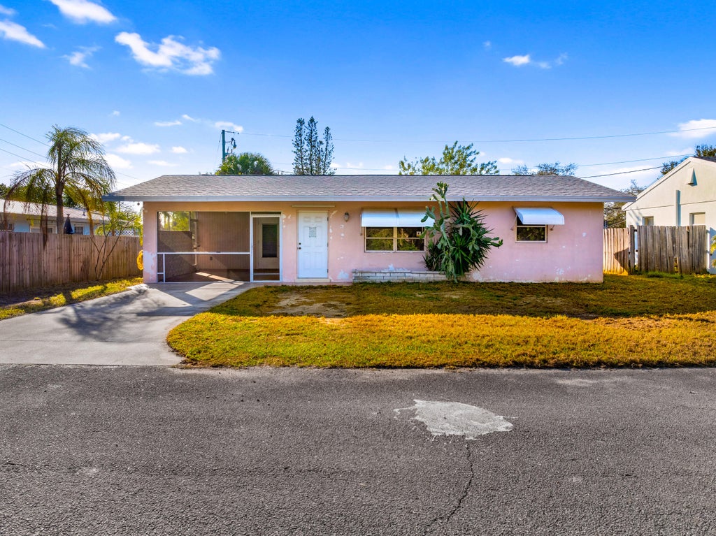 Photo of 1772 NE 23rd Drive, Jensen Beach, FL 34957 (MLS # R11060929)