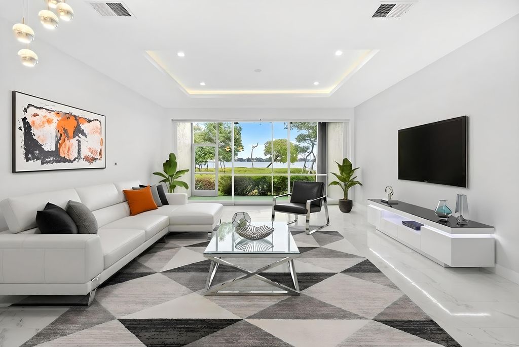 Photo of 88 N Lakeshore Drive, Hypoluxo, FL 33462 (MLS # R11155213)