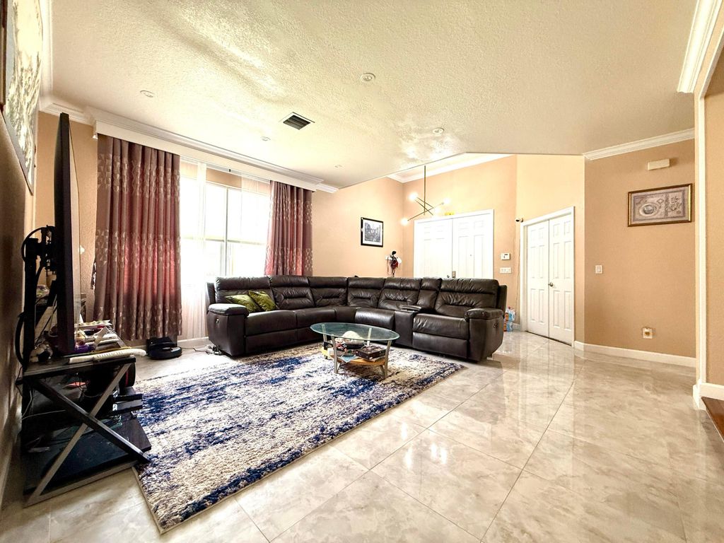 Photo of 1763 SW Newport Blvd, Port Saint Lucie, FL 34953 (MLS # B26010596)