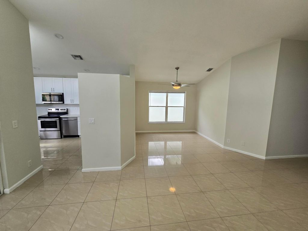 Photo of 1041 Fairfax Circle W, Boynton Beach, FL 33436 (MLS # B26002066)