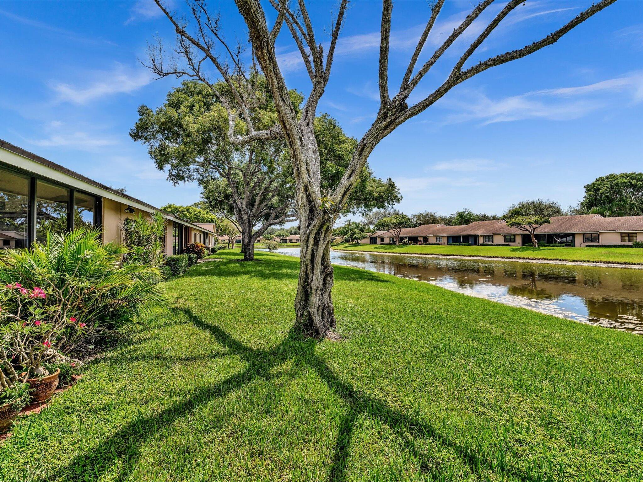 Well priced private Villa w a view, Lg 2/2, split bedrooms,plus glass enclosed patio facing lake w 1 car garage but 2 extra parking spaces. This home features dining room/living room plus an upgraded eat-in kitchen. All new appliances including new full size washer/dryer, This large, open airy condo has the feel of a single family home and it is in the much desired Park Shore section of Whisper Walk. Privacy from neighbors, facing lake, plus walking distance to all the amenities offered. Whisper Walk,55+ Gated community set on 300 well maintained acres w lakes and parks. Perfect for long strolls. Amenities include 7 Tennis courts & 6 Pickle ball courts, racquetball, large pool/deck area w/spa, fitness center, sauna, clubhouse w/billiards, library, & exercise. Many social events!!