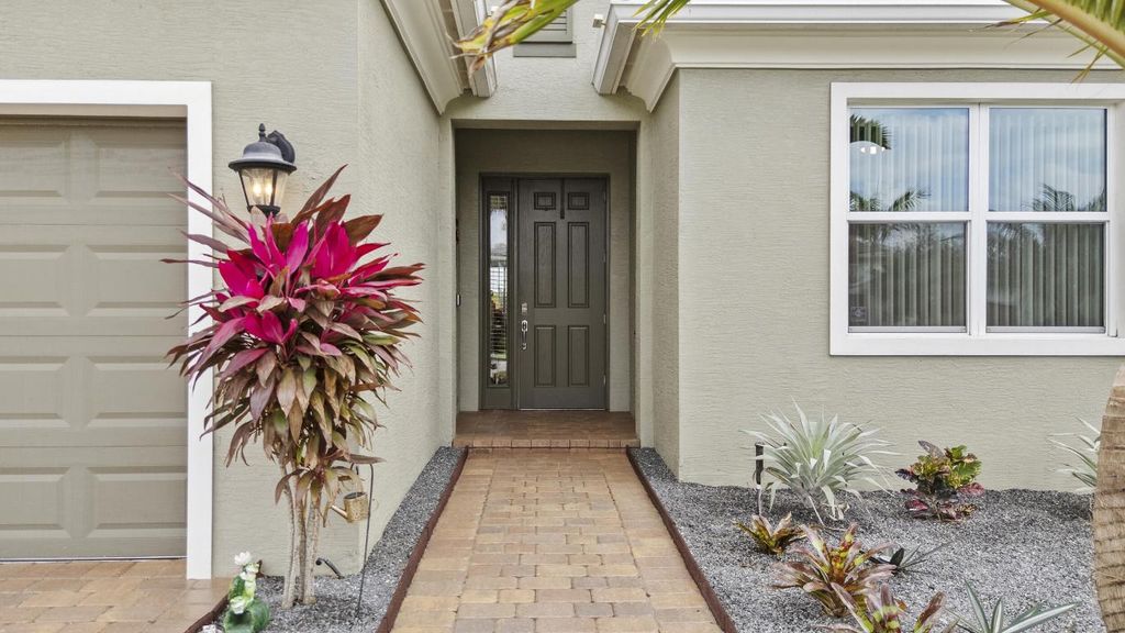 Photo of 8735 SW Vico Way, Port Saint Lucie, FL 34987 (MLS # R11155899)