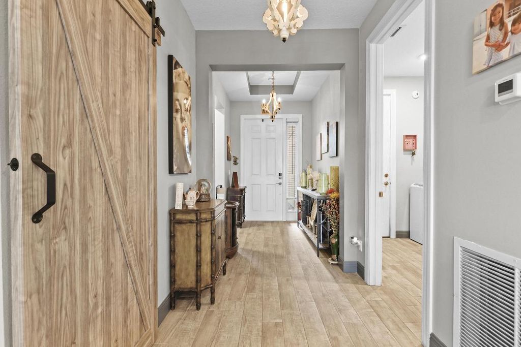 Photo of 8735 SW Vico Way, Port Saint Lucie, FL 34987 (MLS # R11155899)