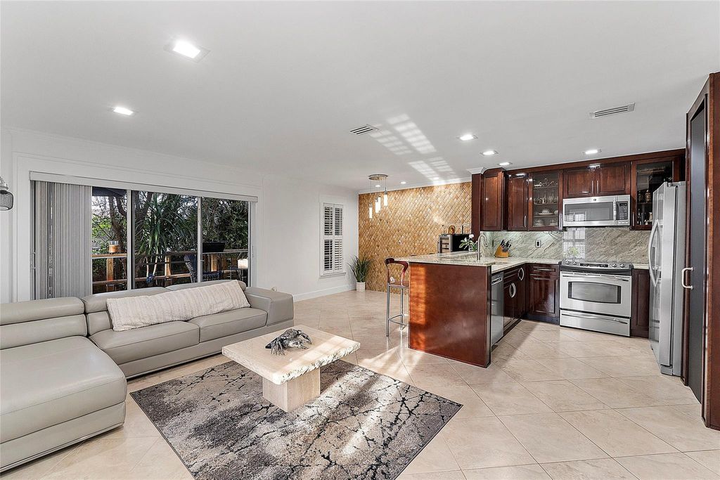 Photo of 3221 NE 16th Street #100, Pompano Beach, FL 33062 (MLS # B26009815)