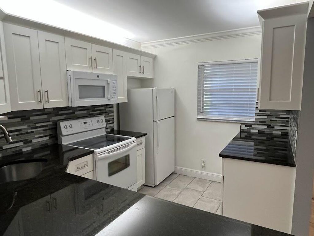 Photo of 829 Camino Road #104-A, Delray Beach, FL 33445 (MLS # R11124615)