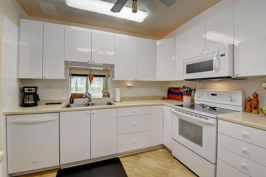 Cozy & relaxing ground floor 2/2 in the heart of Boca Raton; 1080 sq. ft.; great walkability to shops & restaurants; totally upgraded; washer/dryer in the unit, impact glass throughout, custom closets, new electrical panel; spacious kitchen; private & quiet yet minimal steps to a beautiful, large, courtyard pool & spa; ample parking; close to Brightline Train station; Mizner Park is within minutes to enjoy newly opened restaurants, shops and more...