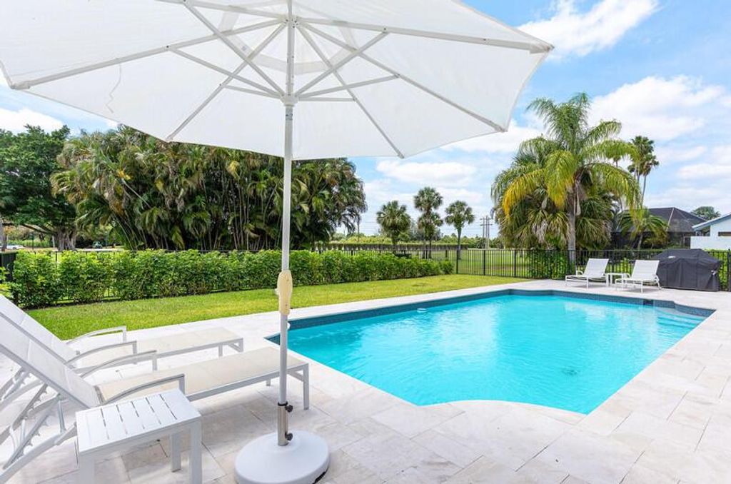 Photo of 11020 Boca Woods Lane, Boca Raton, FL 33428 (MLS # R11084191)