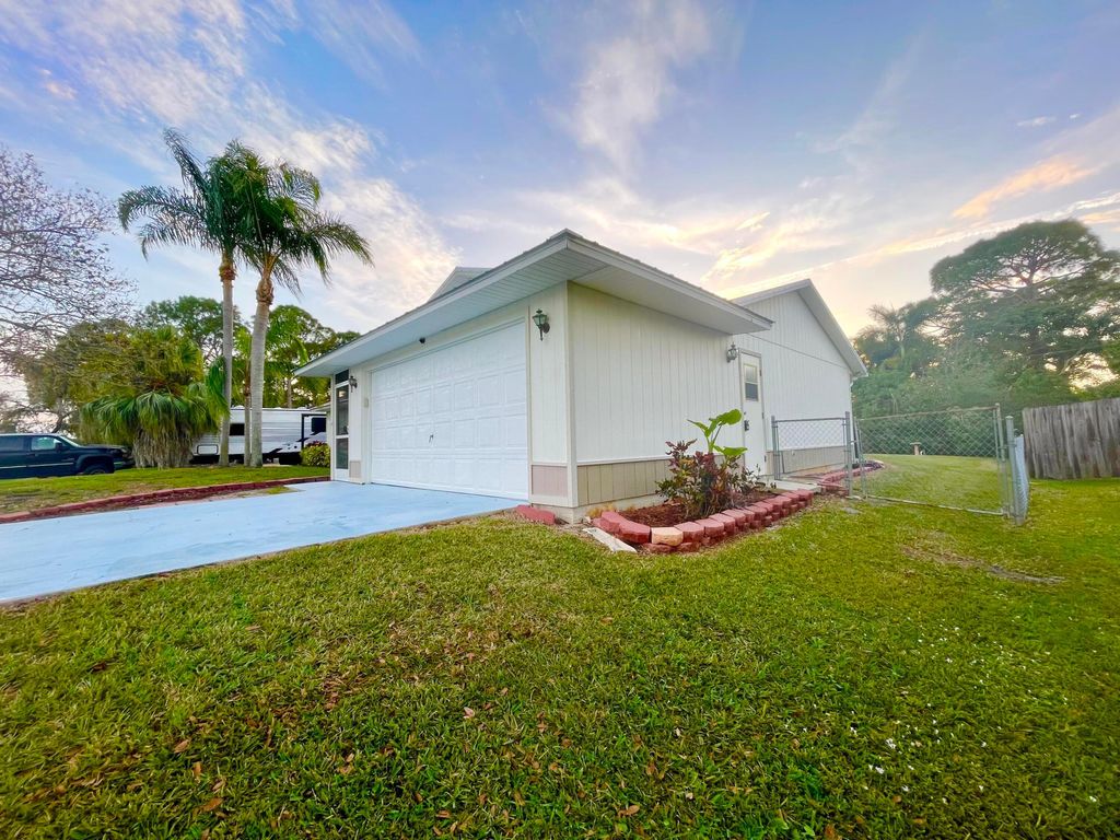 Photo of 1150 SW Jumper Street, Port Saint Lucie, FL 34983 (MLS # B26014469)