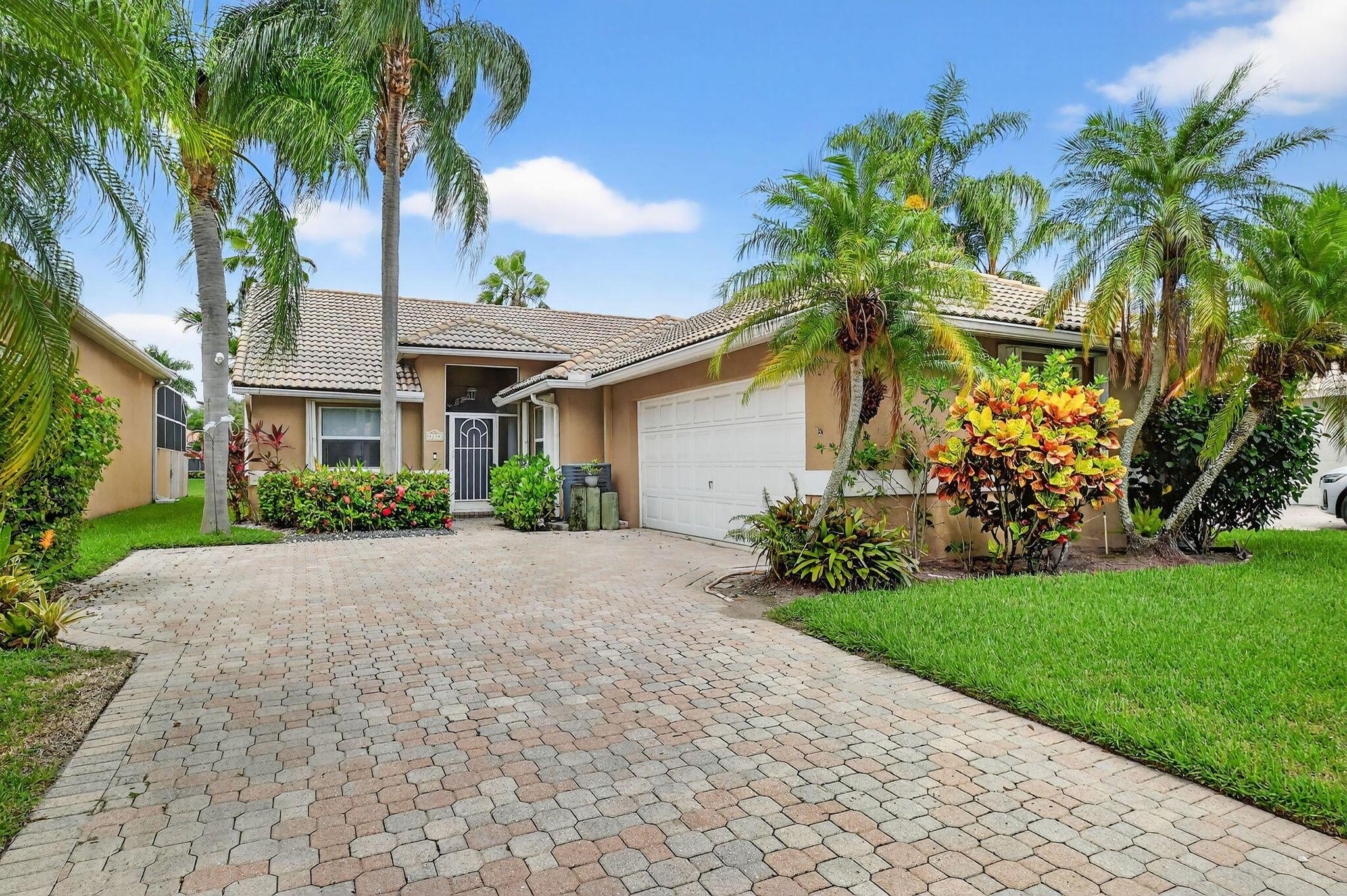 Looking for your Florida dream home? This stunning lakefront property has been completely updated with warm, inviting finishes and breathtaking views! Kitchen remodeled in 2024 with luxury upgrades including quartz countertops, bathrooms tastefully updated, and a Screened patio with serene lake views to enjoy your morning coffee or a relaxing barbecue at the end of the day. The open floor plan offers a separate Den for retreating to read a good book or enjoying some ''me'' time. A/C 2006, W/H 2024, roof original but in great condition. Community offers Resort-style community pool, fitness center & tennis courts. Low HOA includes cable, ADT, landscaping & more! Close to shopping, dining, and everything you need. Don't just dream it--live the Florida lifestyle!