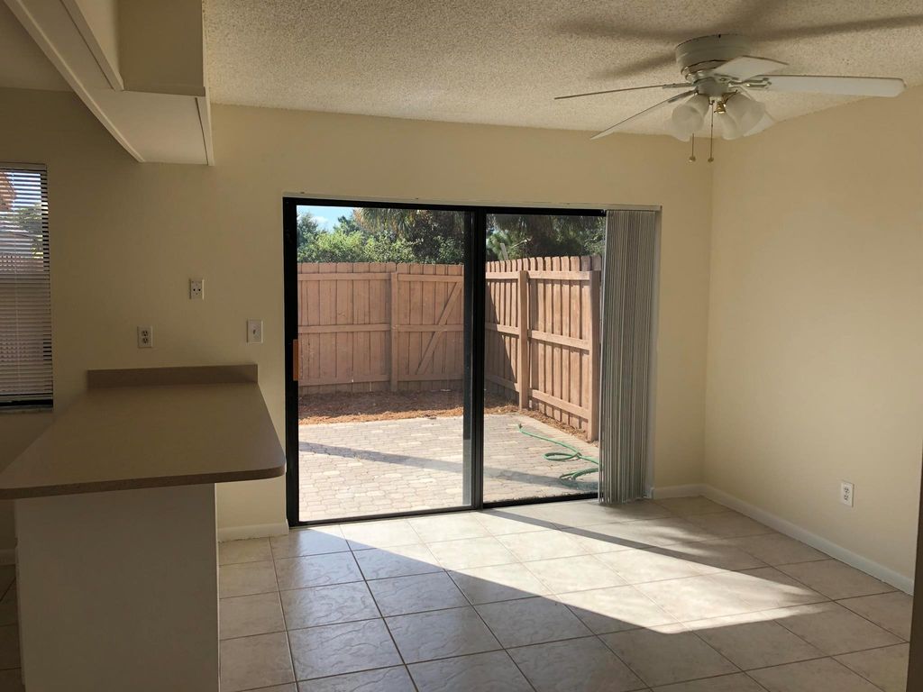 Photo of 803 Sandtree Drive, Palm Beach Gardens, FL 33403 (MLS # R11104212)