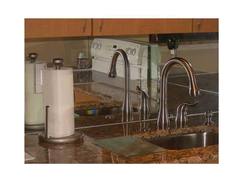 SNUG HARBOR GARDENS CONDO - Residential