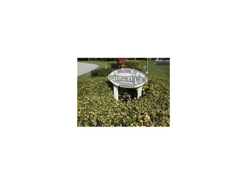 SNUG HARBOR GARDENS CONDO - Residential