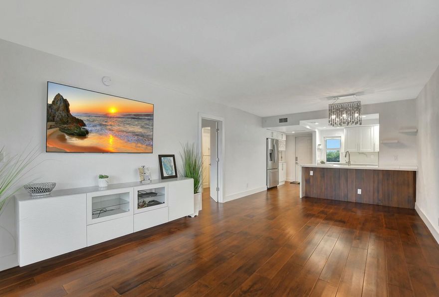 Discover the ultimate coastal retreat in the prestigious gated community of San Remo, perfectly situated in East Boca Raton. This beautifully renovated corner 1-bedroom, 1.5-bath condo is your ticket to luxury seaside living with stunning marina views and private beach access. Step inside to find a light and bright interior designed for relaxation and comfort. The open kitchen is a chef's dream, featuring stainless steel appliances, Impact doors and windows, modern finishes, and a seamless flow into your living space. Elegant hardwood floors create a warm and inviting ambiance, while the spa-inspired bathroom with a rain shower offers a serene escape after a day by the water. Wake up to breathtaking marina views, and enjoy the best of resort-style living with San Remo's top-notch amenities: 24-Hr manned gate, Heated-style Swimming pool and Jacuzzi, Fitness center, Clubhouse with social spaces, Outdoor barbecue and picnic areas. With deeded beach access, you're just steps away from soft sands and ocean breezes, your personal oasis awaits. This prime location also offers easy access to Boca Raton's finest dining, shopping, and entertainment. Experience the charm of a seaside escape combined with modern luxury. Don't wait, schedule your private tour today! Rent includes underground parking space, water, cable, Internet and Trash.