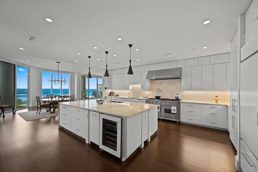 Stunning contemporary double oceanfront residence offering over 8,800 total square feet and sweeping, unobstructed ocean views, this exceptional 5-bedroom, 6 full and 2 half-bath condominium features expansive oceanfront terraces ideal for indoor-outdoor living. A rare double-unit layout includes a private library, media room, gourmet kitchen, and five dedicated parking spaces, all within a premier full-service building offering a pool, spas, state-of-the-art fitness center, and full-time on-site management.