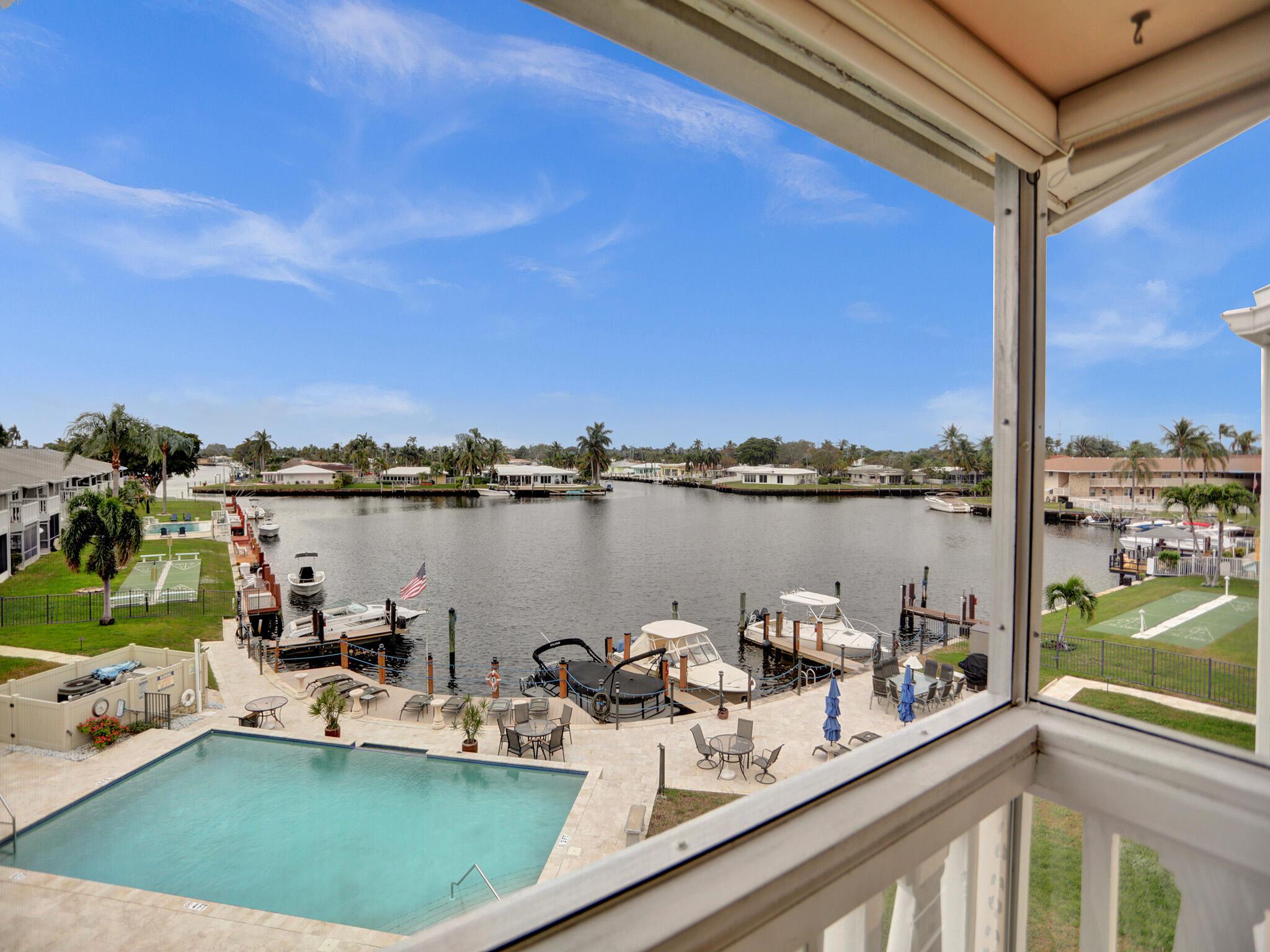 Your Coastal Paradise Awaits! This spectacular unit positioned as a 3rd floor offers 2 Bedrooms, 2 Bathrooms with Waterfront View and a serene community pool relaxation. Don't miss this opportunity!!! Savor the lifestyle you deserve and make this condo your own piece of paradise in the hearth of Pompano Beach. Featuring impact windows and doors