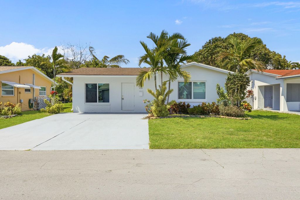 Photo of 6703 NW 62nd Street, Tamarac, FL 33321 (MLS # B26023552)