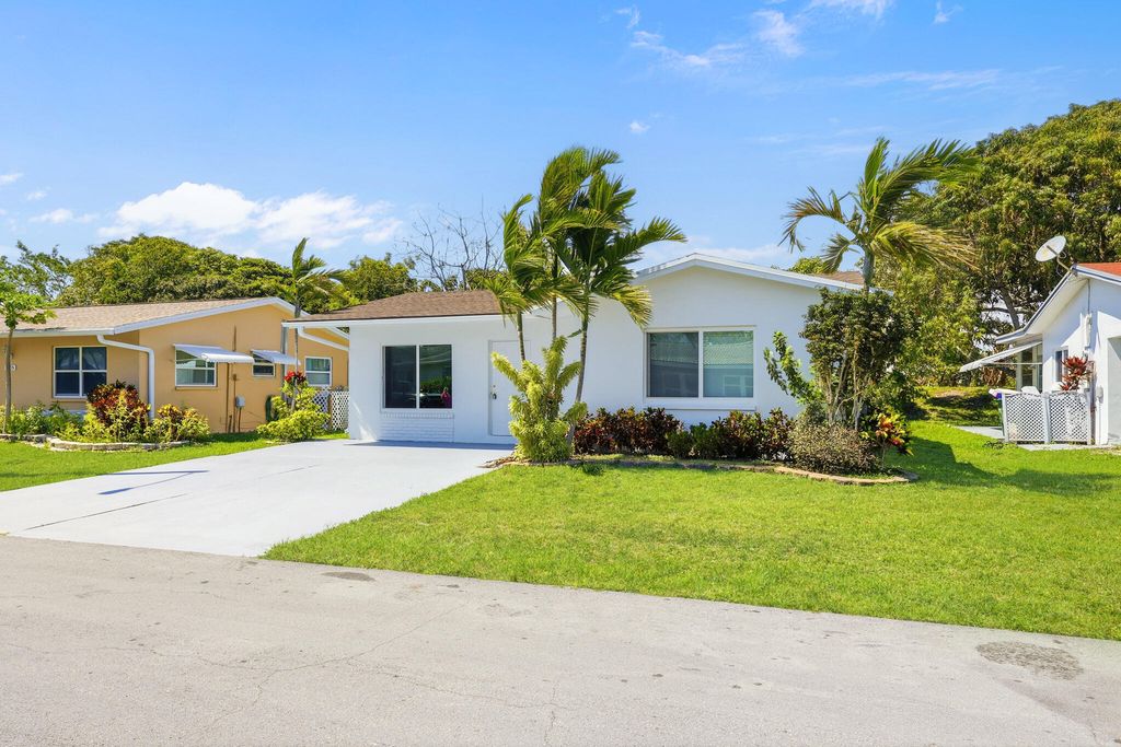 Photo of 6703 NW 62nd Street, Tamarac, FL 33321 (MLS # B26023552)