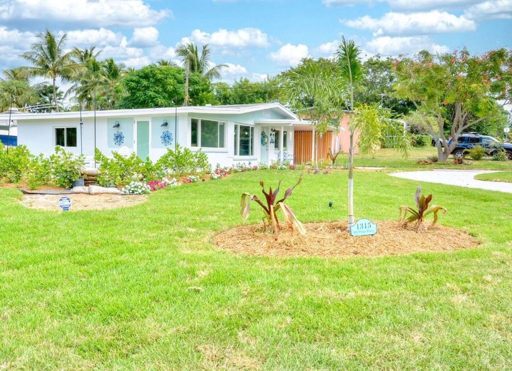 Photo of 1315 NE Flora Place, Jensen Beach, FL 34957 (MLS # R10941643)