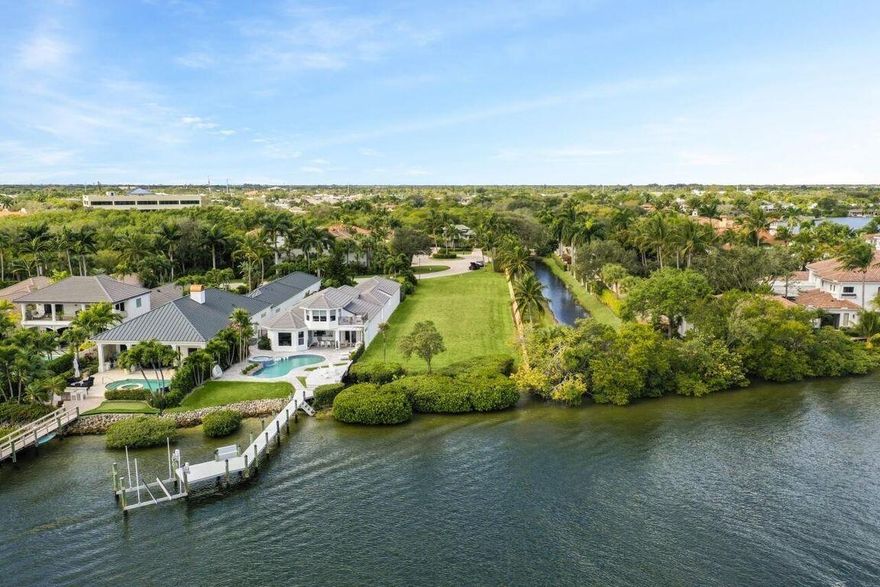 Great location located east of the railroad bridge on the ICW. Just a short boat ride to the inlet, deep water, no wake zone. Close to shoppng  easy bike to the beach. Gated subdivsion just off Indiantown Road. Lot is shovel ready with a complete set of home plans available.