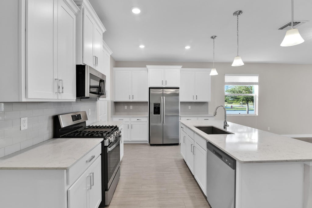 Photo of 1168 Sterling Pine Place, The Acreage, FL 33470 (MLS # B26038532)