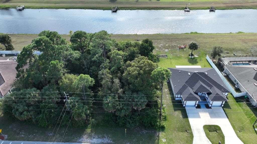Photo of 850 SW Sultan Drive, Port Saint Lucie, FL 34953 (MLS # R11144276)