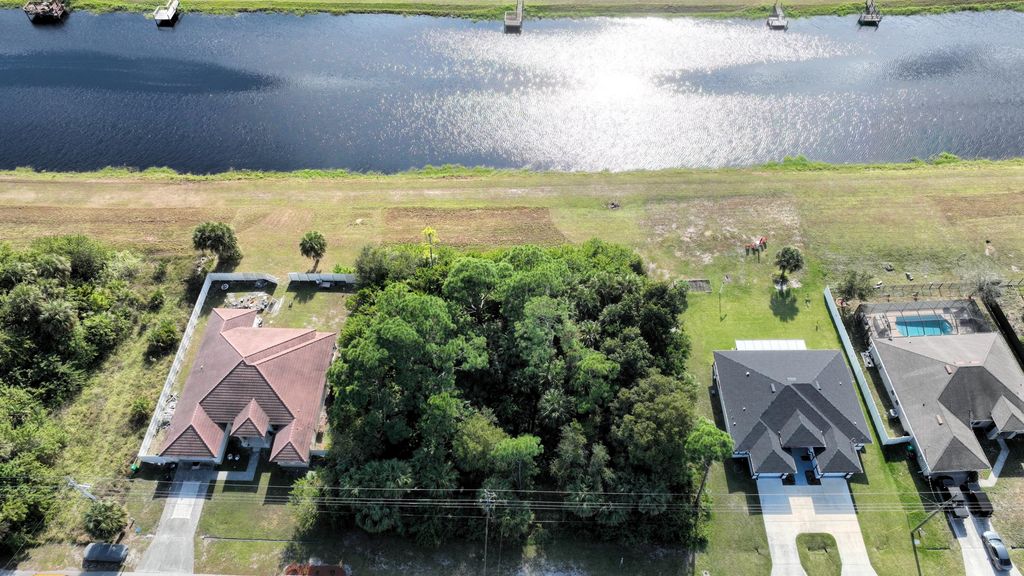 Photo of 850 SW Sultan Drive, Port Saint Lucie, FL 34953 (MLS # R11144276)