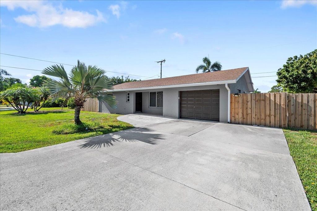 Photo of 9110 Banquet Way, Lake Worth, FL 33467 (MLS # R11165384)