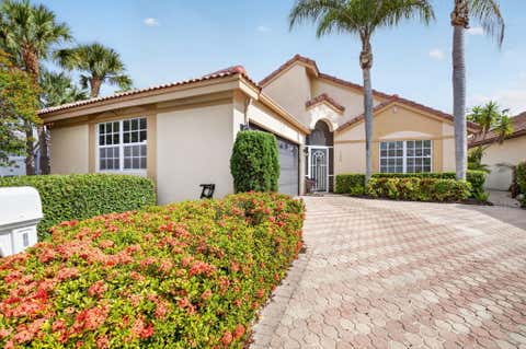 Photo of 7558 Ironbridge Circle, Delray Beach, FL 33446 (MLS # B26029640)