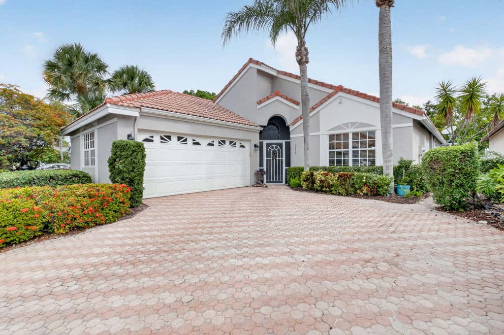 Photo of 7558 Ironbridge Circle, Delray Beach, FL 33446 (MLS # B26029640)