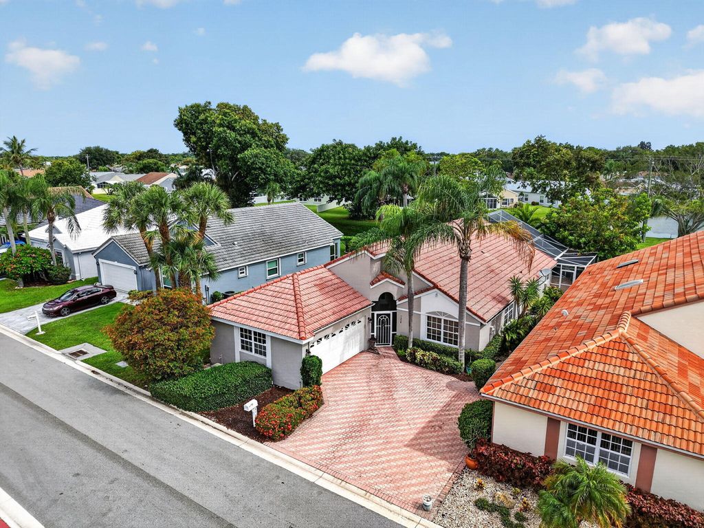 Photo of 7558 Ironbridge Circle, Delray Beach, FL 33446 (MLS # B26029640)