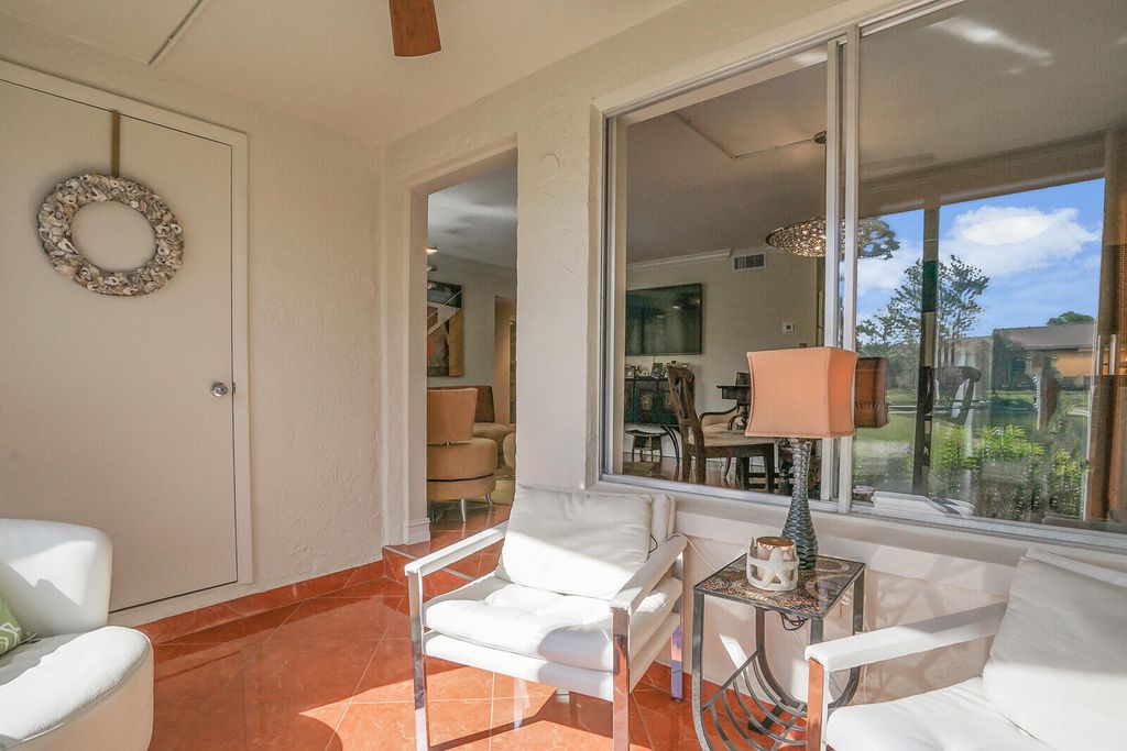 Photo of 326 Knotty Pine Circle #C-1, Greenacres, FL 33463 (MLS # R11097543)