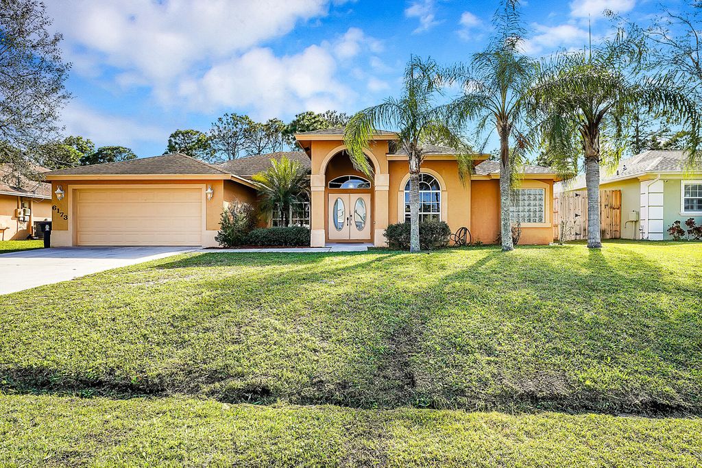 Photo of 6173 NW East Deville Circle, Port Saint Lucie, FL 34986 (MLS # B26056311)