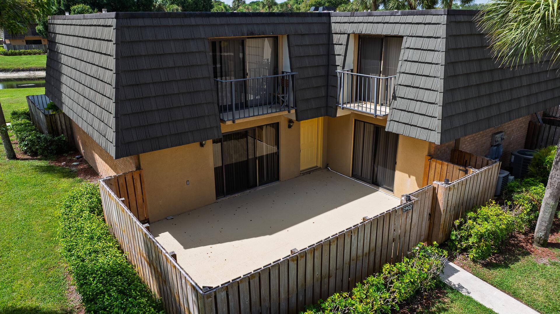 Welcome to this charming 2-bedroom, 2.5-bathroom townhome located in the sought-after Village of Sandalwood Lakes. Step outside to enjoy a spacious, private fenced patio--perfect for entertaining or relaxing with family and friends.Inside, you'll love the open and airy floor plan, complemented by a brand-new stainless steel refrigerator and a new washer and dryer. Upstairs, fresh carpeting runs throughout, adding comfort and style to the bedrooms.The community offers an array of outdoor amenities, including a sparkling pool, tennis courts, and a playground for the little ones. Conveniently situated just minutes from I-95, PBI Airport, and vibrant Downtown West Palm Beach, this home combines comfort with accessibility.Don't miss the opportunity to make this townhome yours.