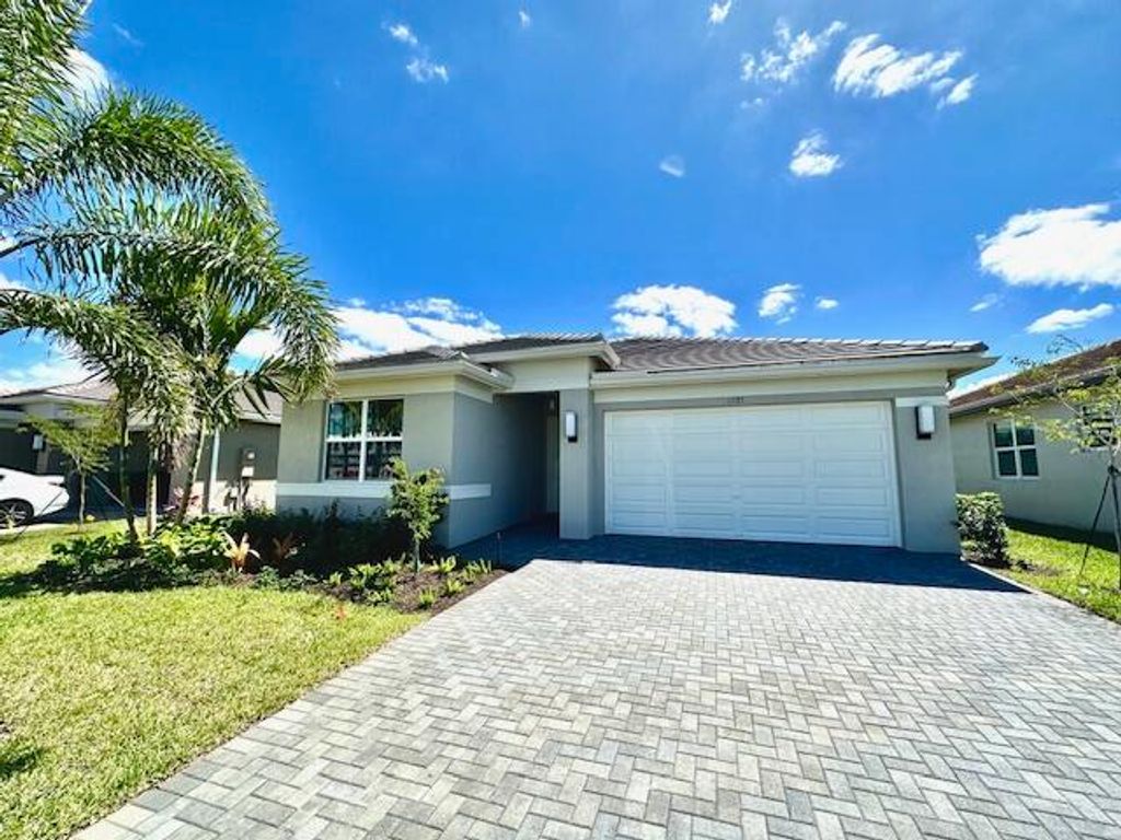 Photo of 11785 SW Oceanus Boulevard, Port Saint Lucie, FL 34987 (MLS # B26047671)