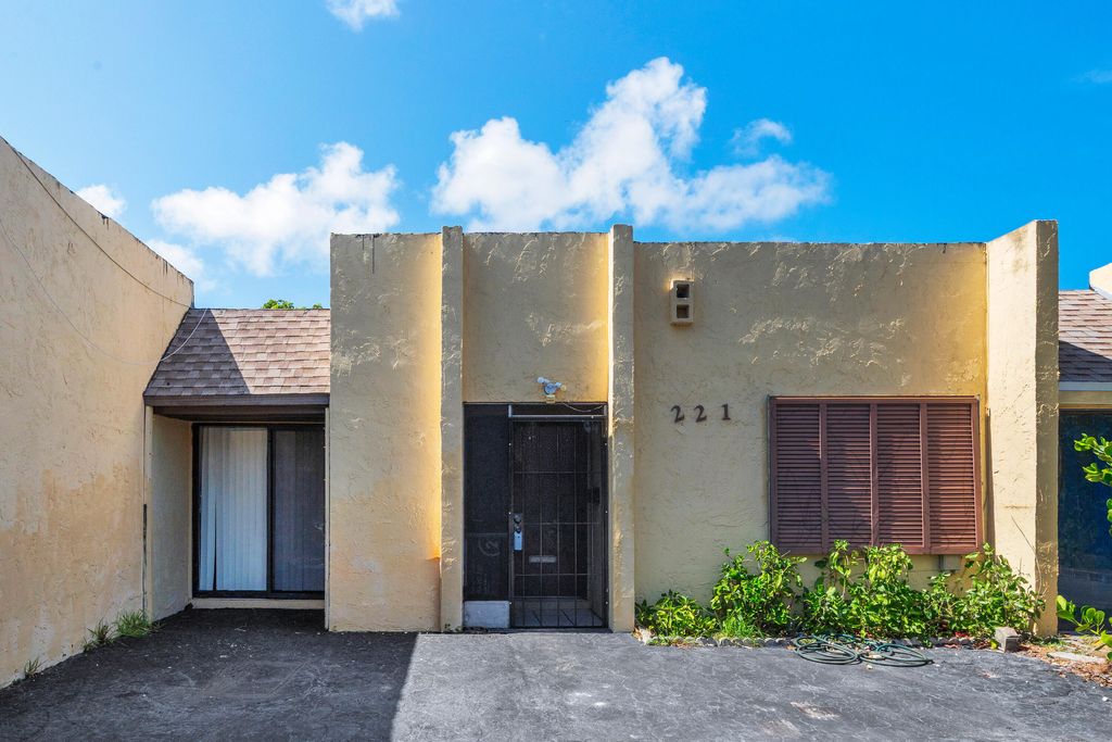 Photo of 221 NW 43rd Place, Deerfield Beach, FL 33064 (MLS # B26056422)