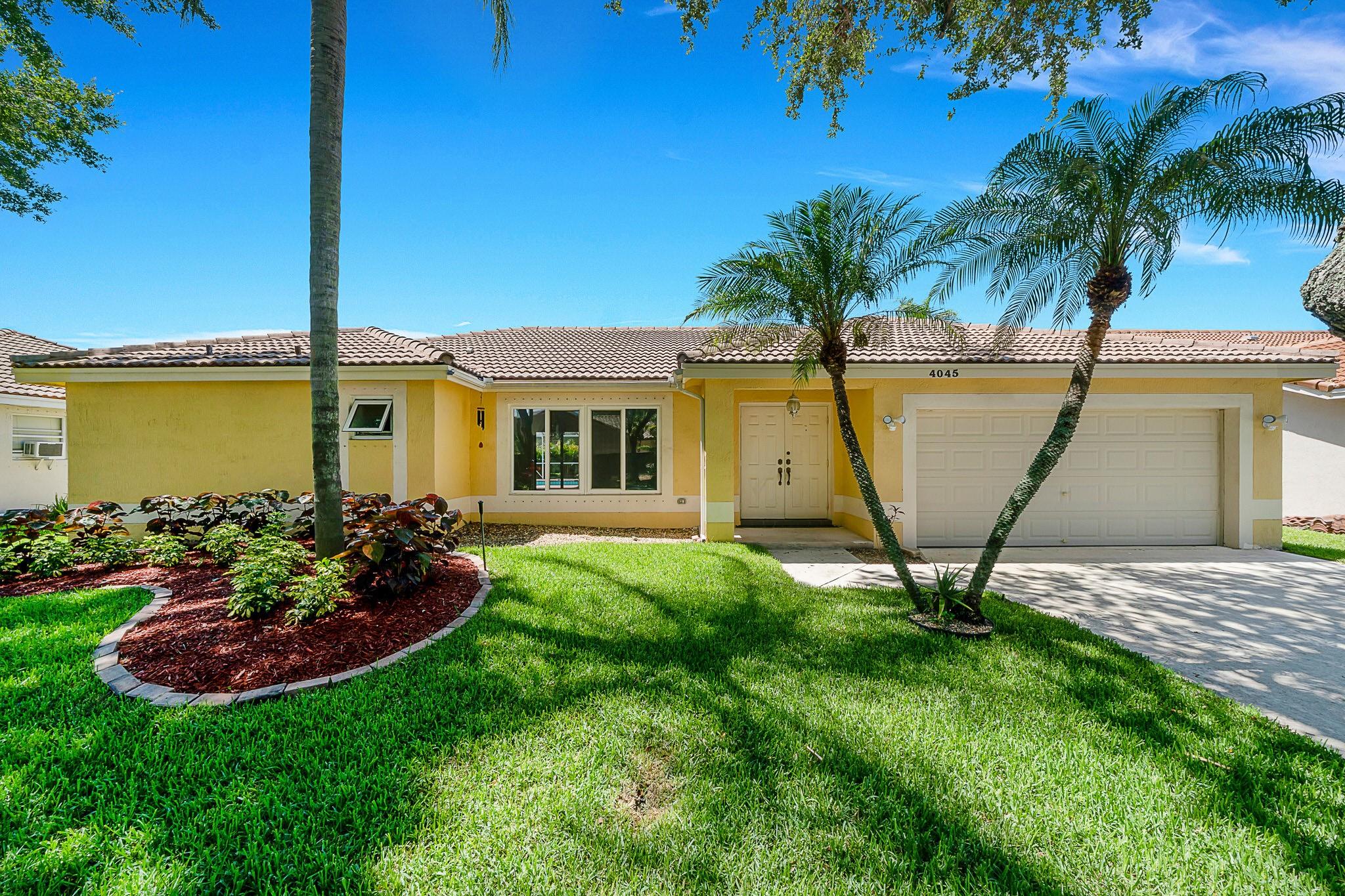 Welcome to this well maintained 4 bedroom, 2 bathroom home located in the highly sought after community of Winston Park in Coconut Creek. This spacious split floor plan offers both comfort and privacy, with the primary suite set apart from the additional bedrooms. Enjoy Florida living at its best with your own private pool, ideal for entertaining or simply unwinding after a long day. Backyard has mature fruit trees. The kitchen and living areas flow seamlessly to the outdoor space, creating the perfect indoor outdoor lifestyle. Full hurricane protection and a brand new A/C unit provides energy-efficient cooling year round for peace of mind and comfort. Winston Park is known for its tree lined streets, great schools, and easy access to parks, shopping, and major highways.