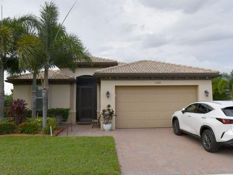 Photo of 11320 SW Lake Park Drive, Port St Lucie, FL 34987 (MLS # R11136006)