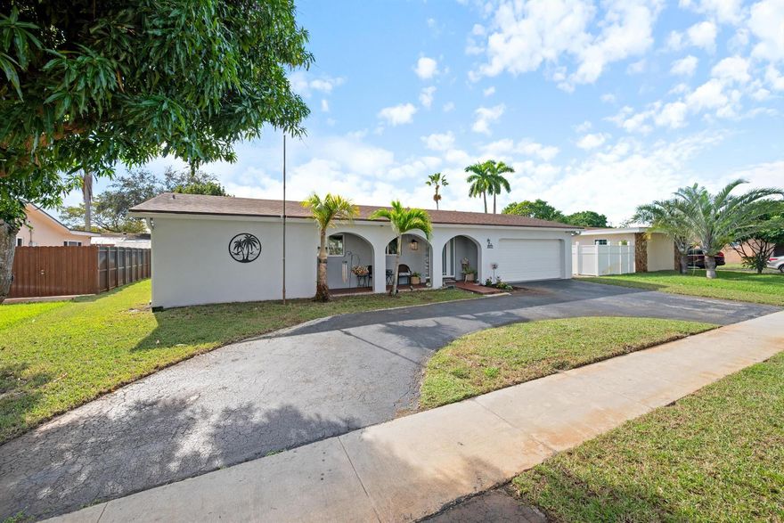 Welcome to this beautifully refreshed Pembroke Pines home offering a warm, inviting vibe in a quiet, tree-lined neighborhood. Features include a circular driveway, impact windows and doors, a 2019 roof, and a new 2024 A/C. The kitchen, living room, dining room, and bathroom have been tastefully remodeled, creating a bright and comfortable living space. Enjoy a spacious laundry/mud room off the 2-car garage and a generous backyard with room for a pool. Ideal for families or empty-nesters seeking comfort and convenience near major highways, shopping, dining, parks, hospitals, and easy access to Fort Lauderdale and Miami airports.