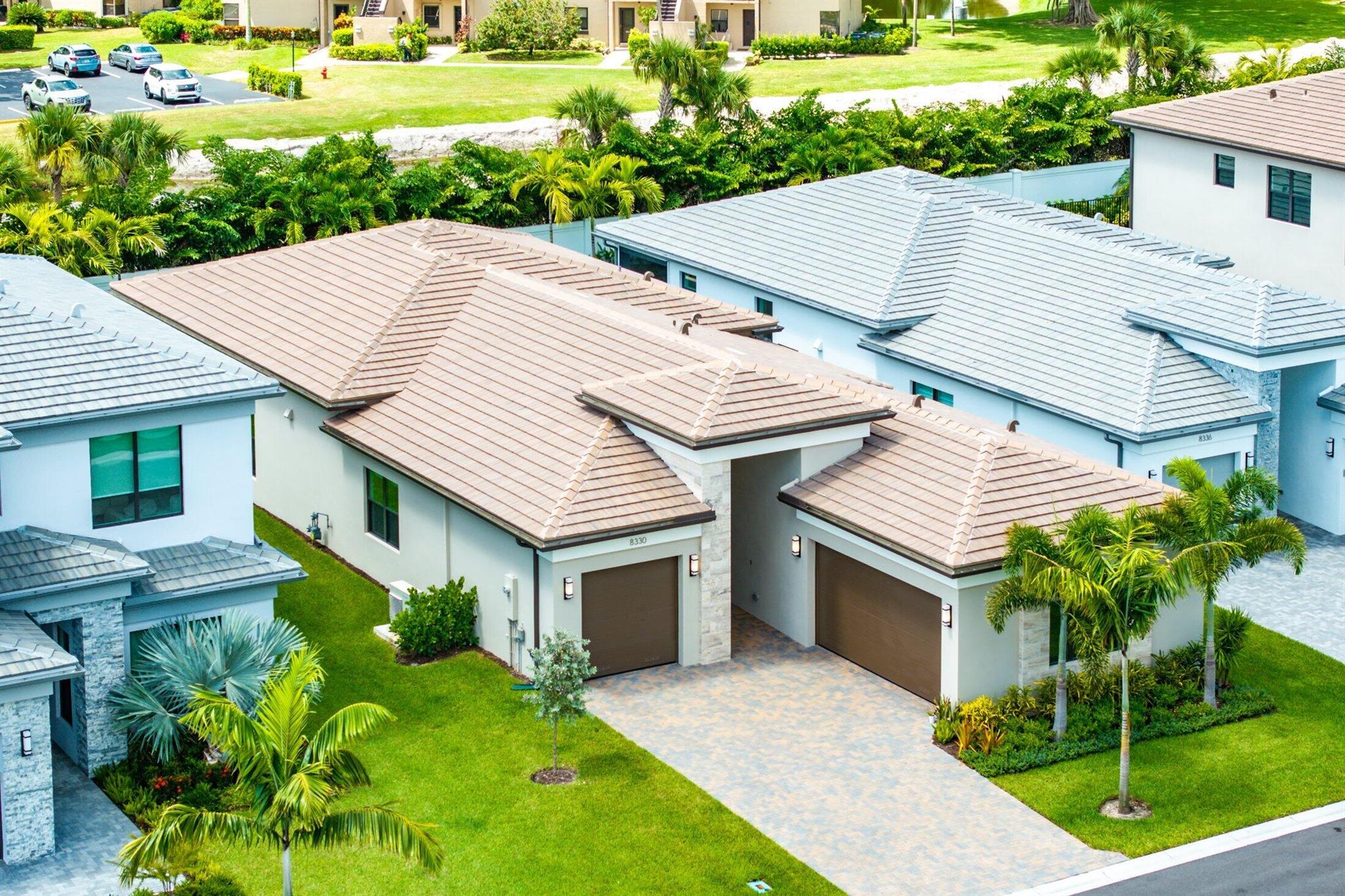Single story Bermuda home in Lotus Palm ready for the most discerning buyer. 3 bedrooms plus an office/den, 3 1/2 bathrooms, 3 car garage. White tile floors throughout. Upgraded high kitchen cabinets with pullouts. GE appliances. Whole house water filter. Custom closets. Electric blackout shades. Summer kitchen. Garage floor epoxy and cabinets. South facing backyard with room for a pool. Resort-style living with an expansive brand new clubhouse boasting extensive amenities: 6 tennis courts, 5 pickleball courts, the Crave restaurant and pool-side bar, fitness center, yoga garden, full indoor basketball court, children's arcade, gleaming pools and a spa. Prime location off Glades Road near all of Boca Raton's best shopping, dining and top rated schools. Live a Floridian dream lifestyle!