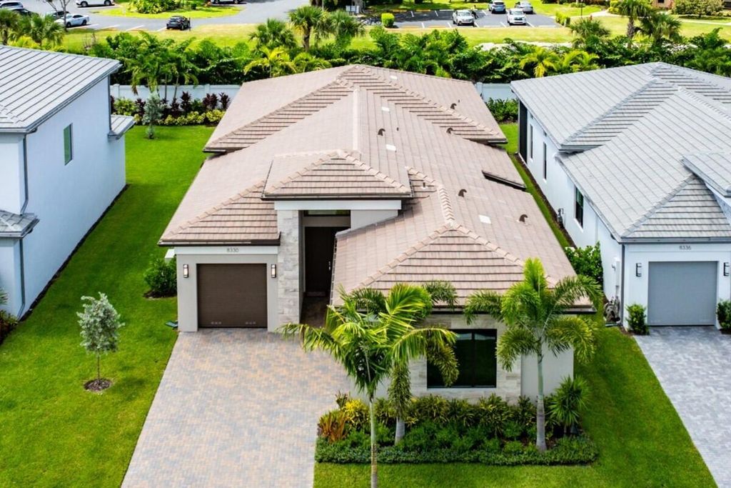 Photo of 8330 Essex Country Club Drive, Boca Raton, FL 33434 (MLS # R11113685)