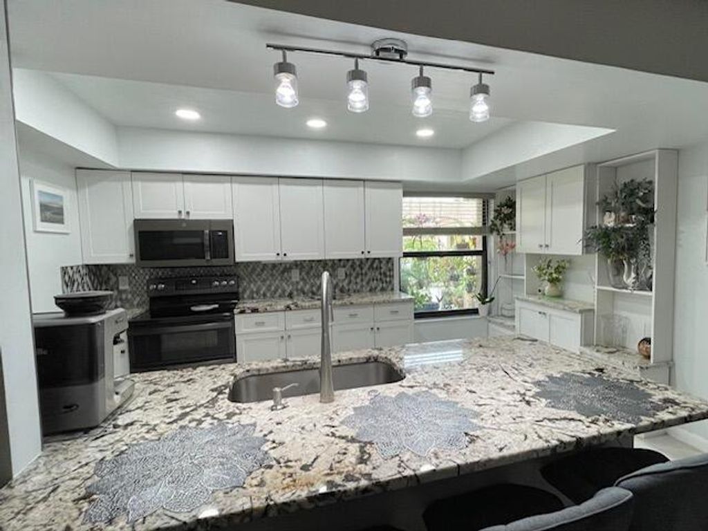 Photo of 5975 Forest Grove 3 Drive #3, Boynton Beach, FL 33437 (MLS # R11111775)