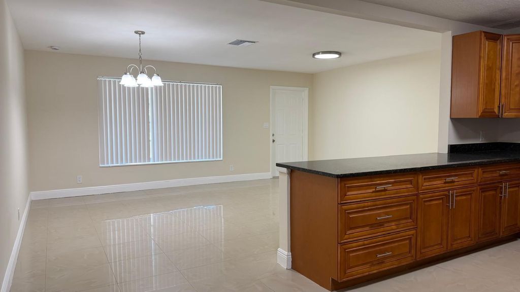 Photo of 4081 NW 35th Avenue, Lauderdale Lakes, FL 33309 (MLS # B26010858)