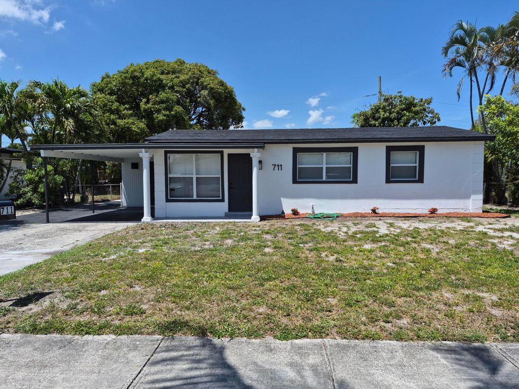 Photo of 711 NW 18th Street, Pompano Beach, FL 33060 (MLS # B26023764)
